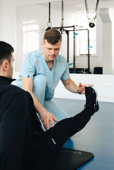 Physiotherapist treating a patient
